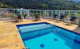 Apartamentos a 200m praia das Toninhas - Condomínio Vista Verde | Piscina na Cobertura com vista Espetacular